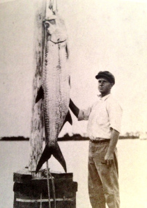 Harold R Johns, posing with a large tarpon, early 19920s, Stuart, St Lucie River. (Photo from Stuart on the St Lucie by Sandra Henderson Thurlow.)